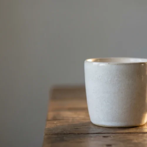 Minimal White Coffee Mug on Table Image
