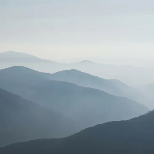 Misty Mountain Layer Background