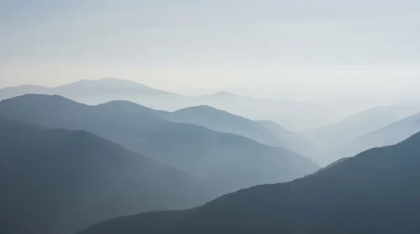 Misty Mountain Layer Background