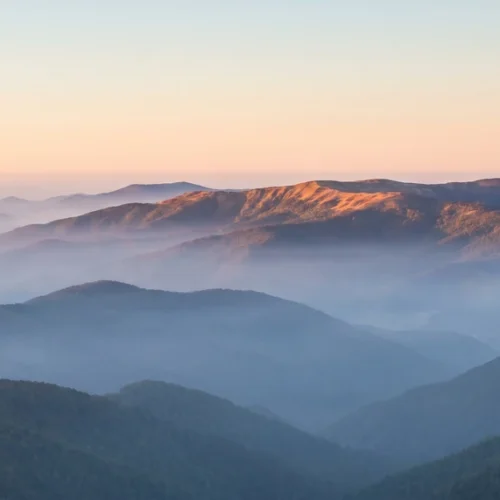 Sunlit Mountain Ridge Background